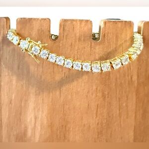Seta gold tone & rhinestone tennis bracelet Women’s jewelry